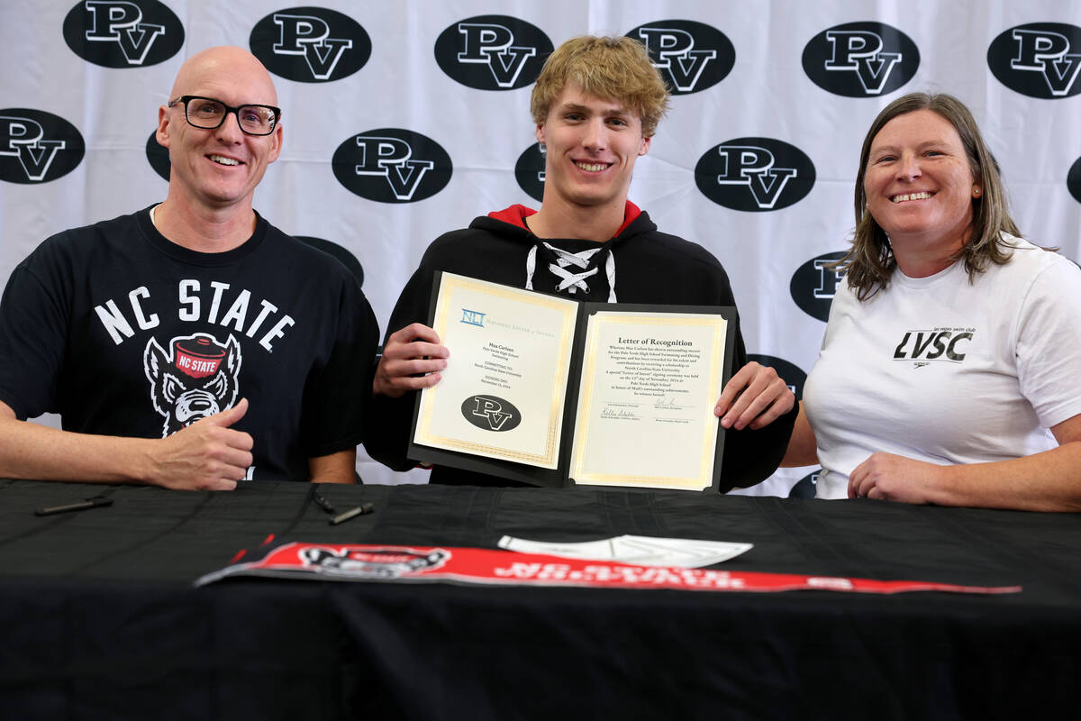 Palo Verde swimmer Max Carlsen shows his signed financial aid agreement for North Carolina Stat ...