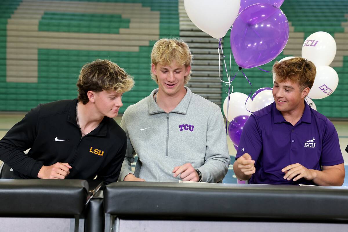 Palo Verde baseball players, from left, Ethan Clauss, Brady Dallimore and Tanner Johns prepare ...