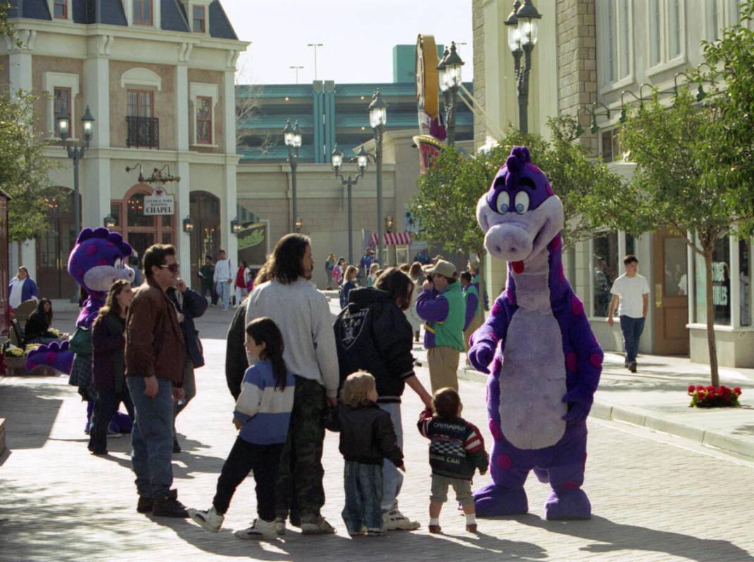 Visitors with costumed characters at MGM Grand Adventures Theme Park. The park opened to the pu ...