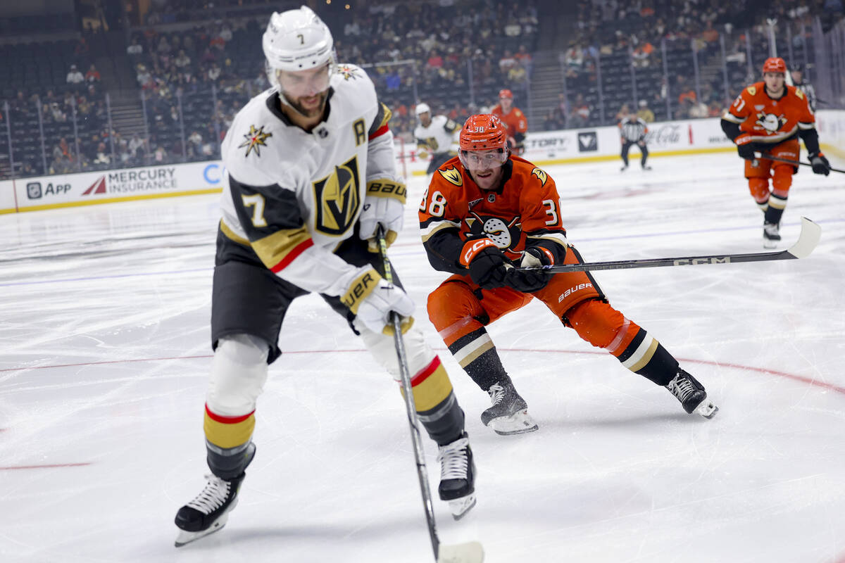 Anaheim Ducks defenseman Jansen Harkins, right, chases Vegas Golden Knights defenseman Alex Pie ...