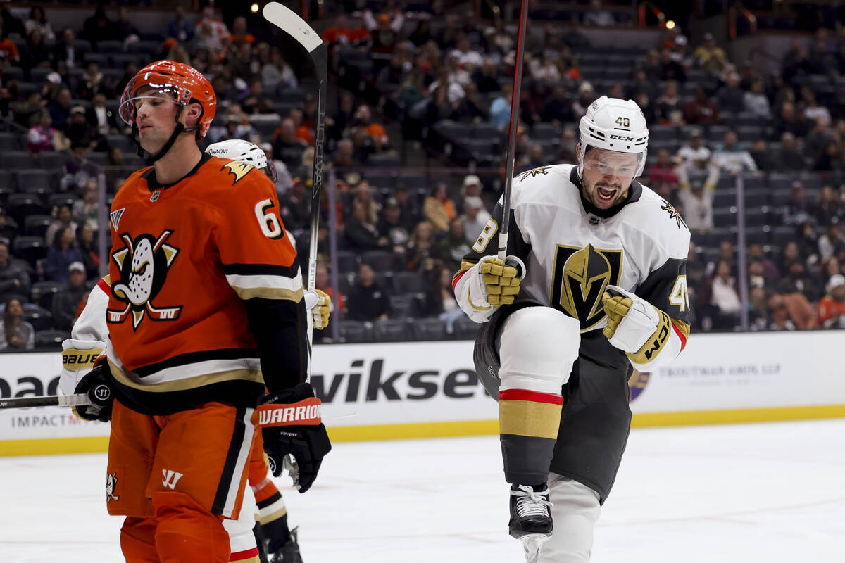 Vegas Golden Knights center Tomas Hertl, right, celebrates next to Anaheim Ducks defenseman Bri ...