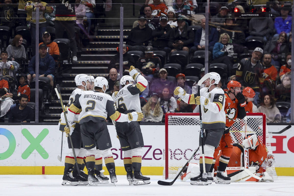 Vegas Golden Knights left wing Pavel Dorofeyev, center, celebrates his goal with teammates duri ...