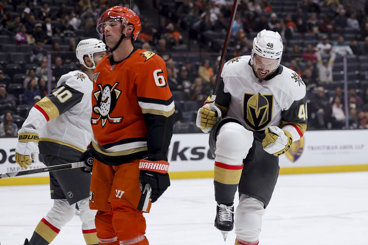 Vegas Golden Knights center Tomas Hertl, right, celebrates scoring a goal next to Anaheim Ducks ...