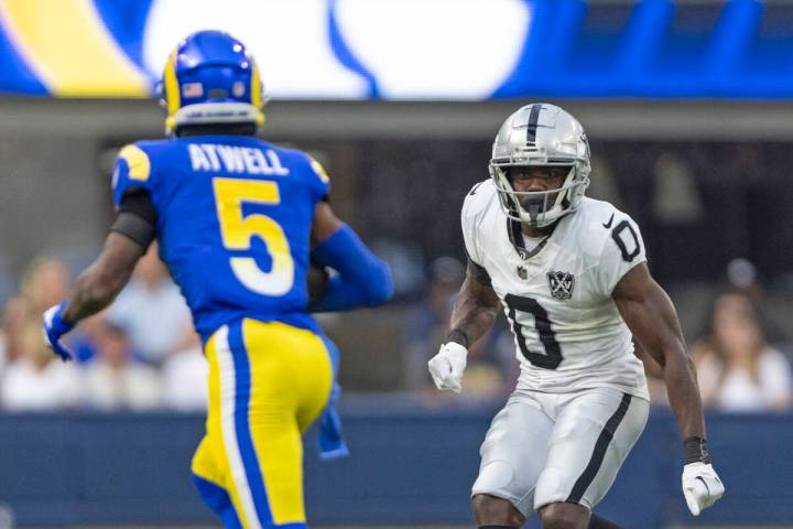 Raiders cornerback Jakorian Bennett (0) looks to tackle Los Angeles Rams wide receiver Tutu Atw ...