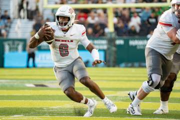 UNLV defensive back Jeremiah Vessel (6) runs the ball during the first half of an NCAA college ...