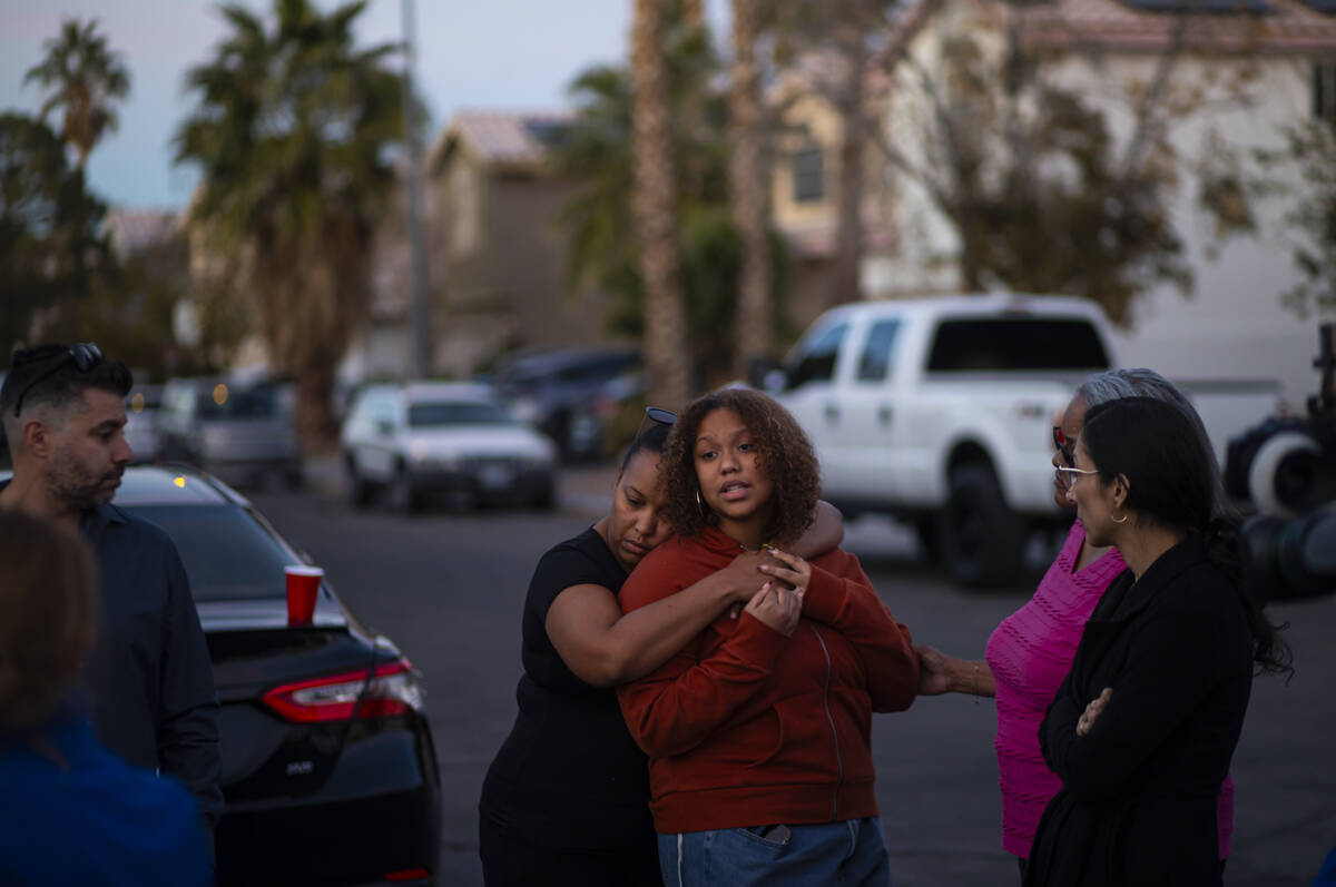 Isabella Durham is comforted by her mother, Ailin Averhoff, while talking about her father, Bra ...