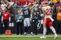 Raiders tight end Brock Bowers (89) signals for a first down after a catch during the first hal ...