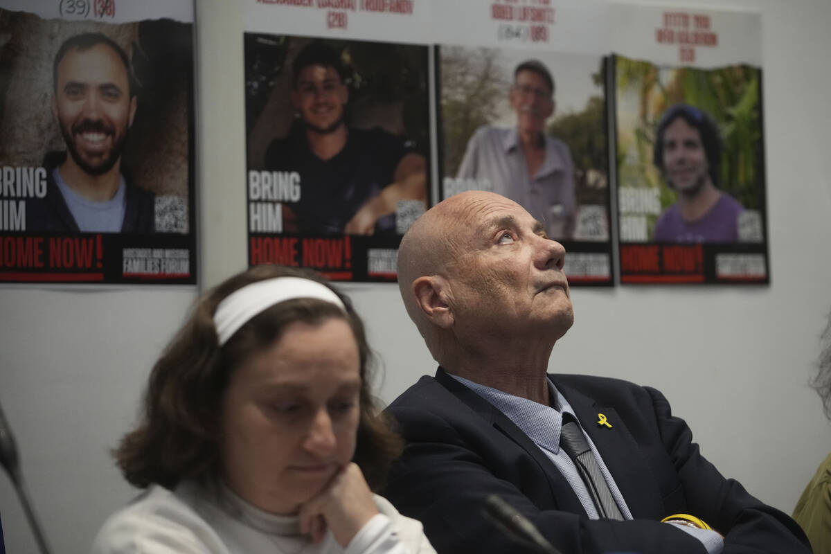 Elena Troufanov, left, and Louis Har, former Israeli hostages and relatives of some still being ...