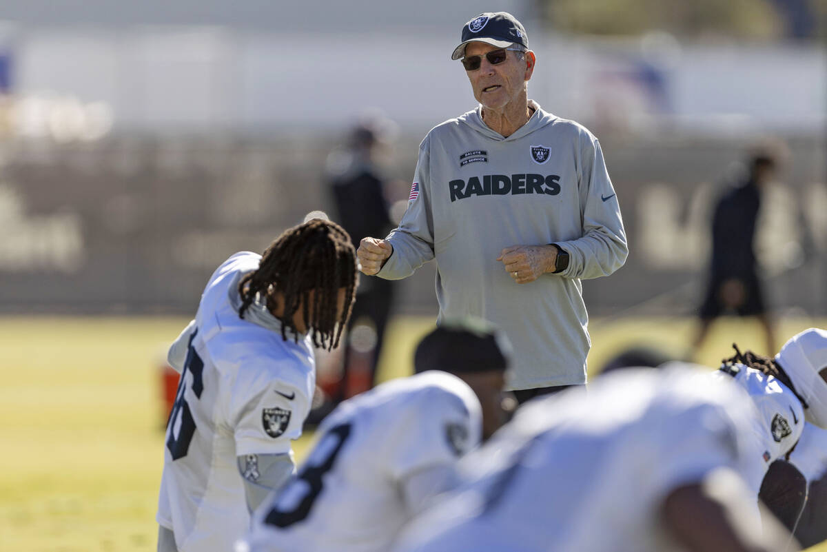 Raiders senior offensive advisor Norv Turner speaks to wide receiver Jakobi Meyers (16) during ...