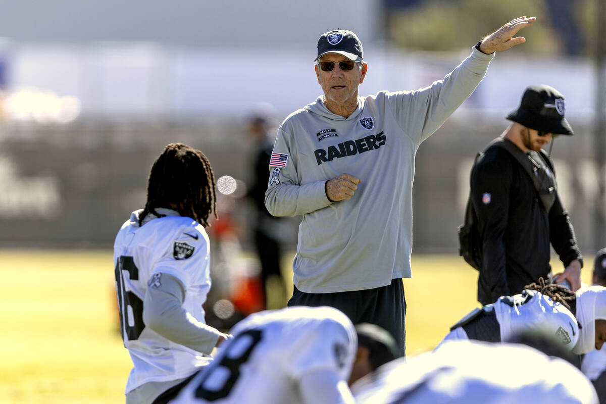 Raiders senior offensive advisor Norv Turner speaks to wide receiver Jakobi Meyers (16) during ...