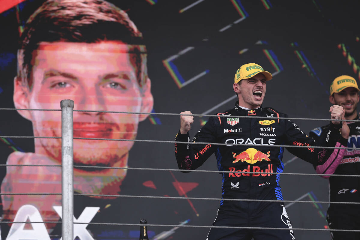 Red Bull driver Max Verstappen of the Netherlands, celebrates at the podium after winning the B ...