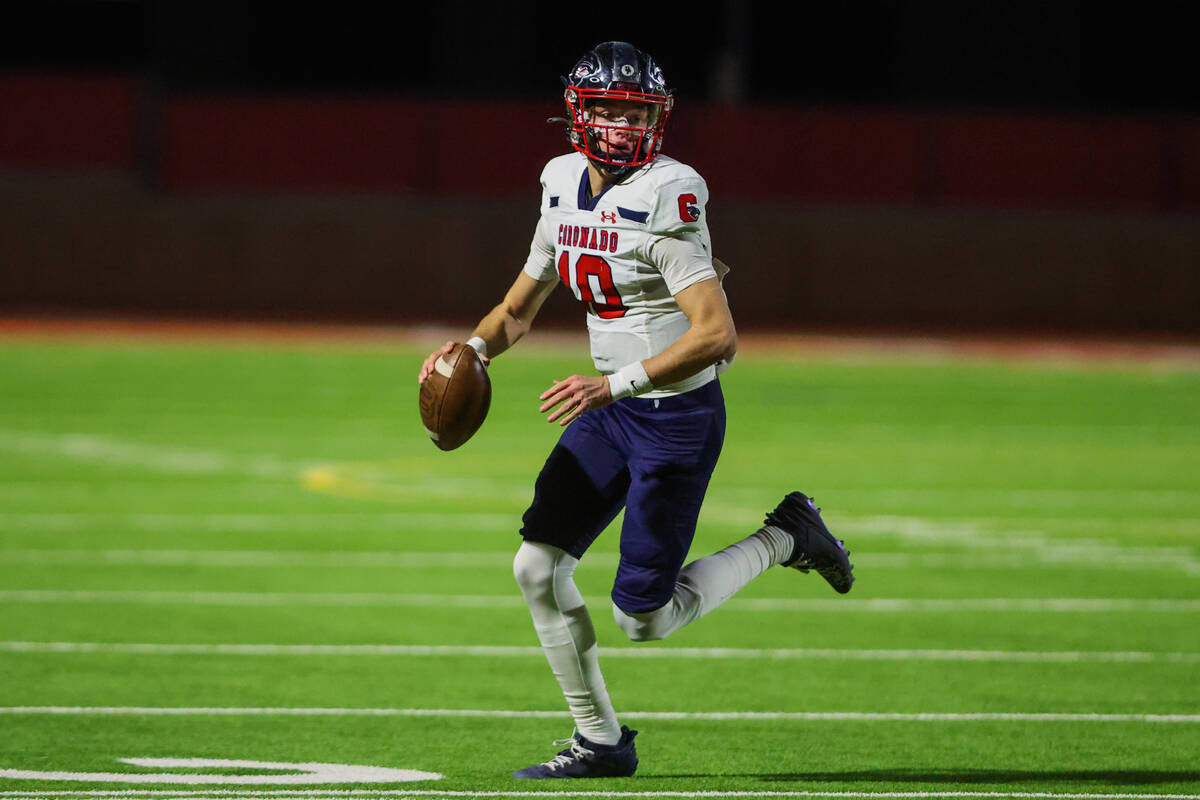 Coronado quarterback Aiden Krause (10) scrambles the ball during a Class 5A Division I state se ...