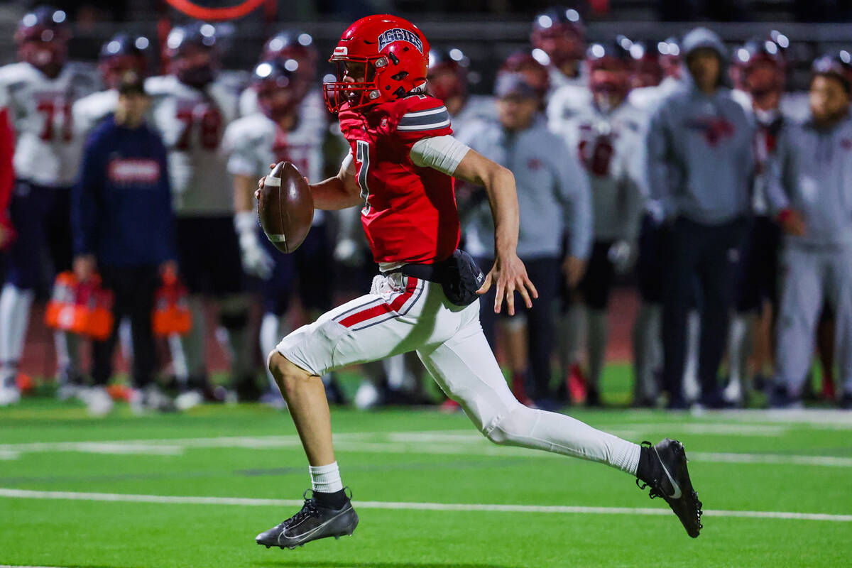 Arbor View quarterback Thaddeus Thatcher (7) scrambles the ball during a Class 5A Division I st ...