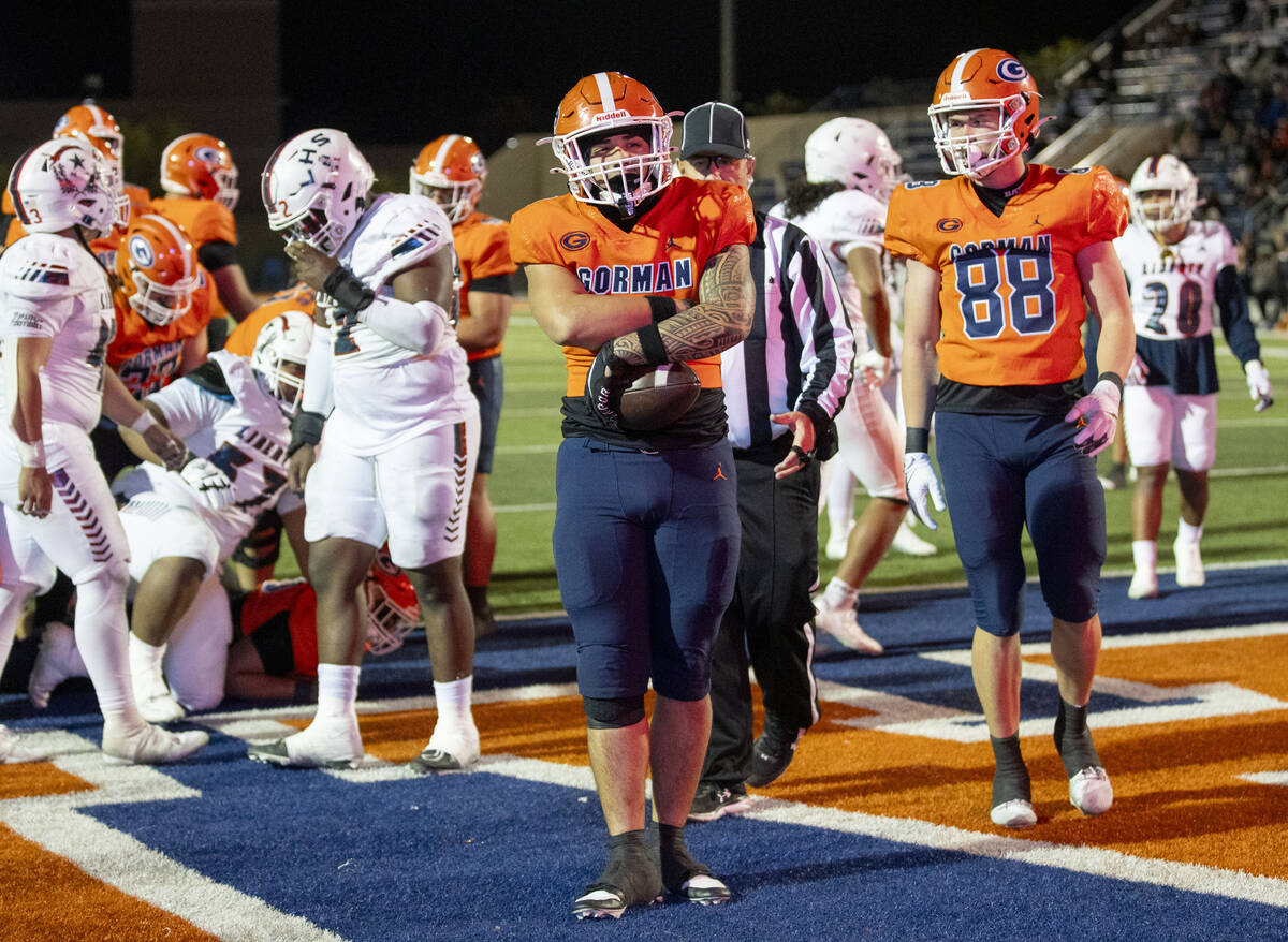 Bishop Gorman linebacker Champ Kapanui (1) celebrates after scoring a touchdown during the Clas ...