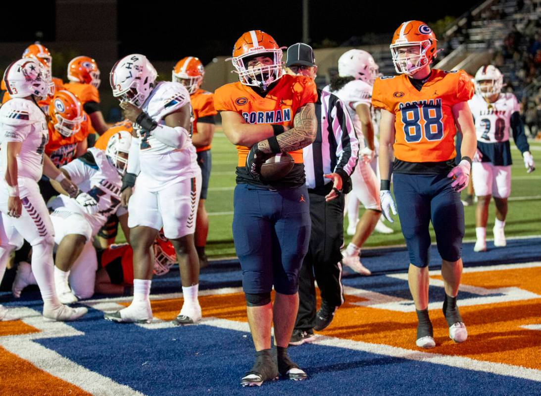 Bishop Gorman linebacker Champ Kapanui (1) celebrates after scoring a touchdown during the Clas ...