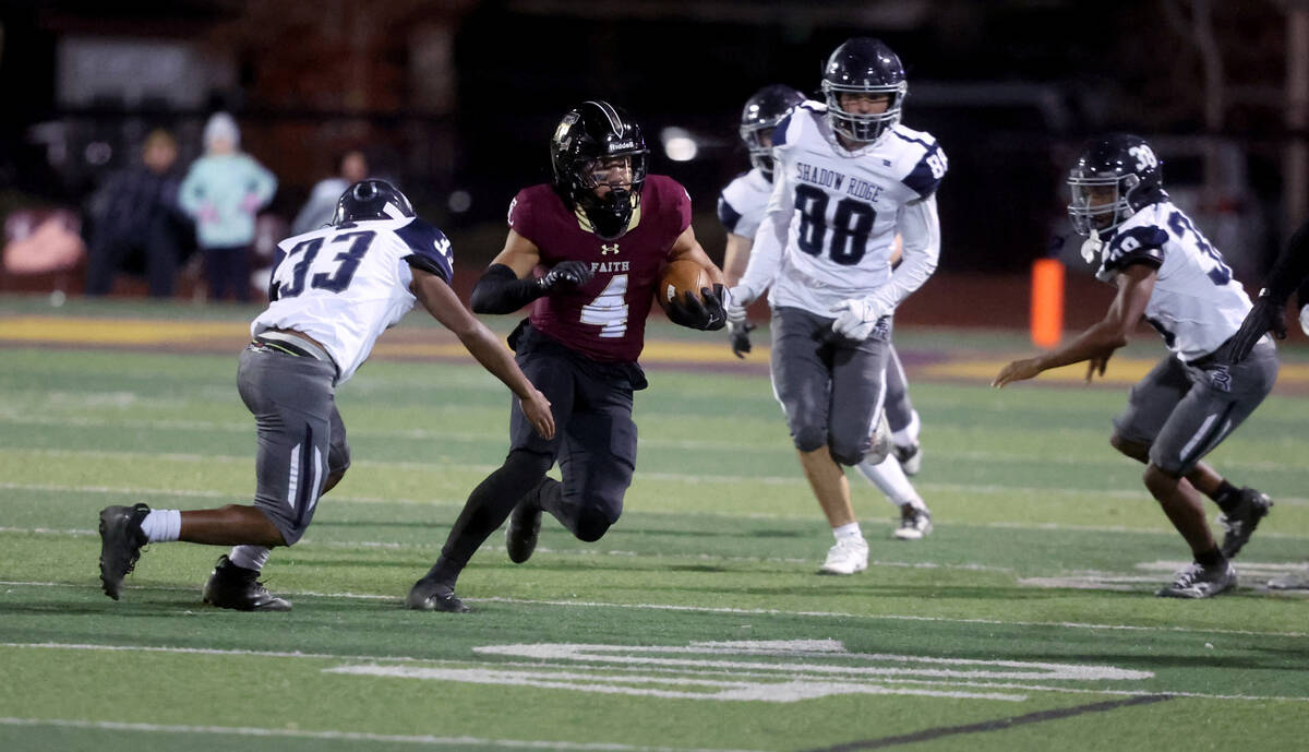 Faith Lutheran wide receiver Rouselle Shepard (4) runs against Shadow Ridge in the first quarte ...