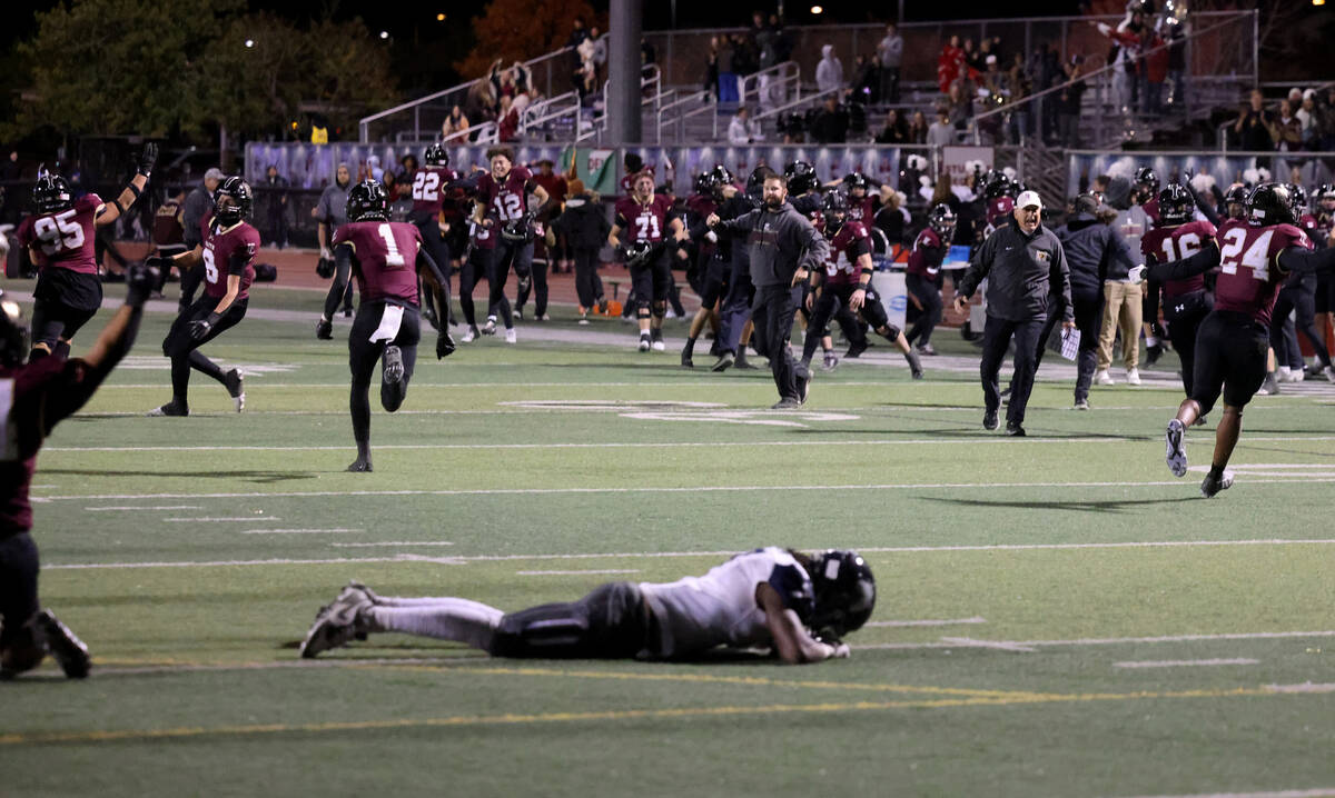 Faith Lutheran celebrates beating Shadow Ridge in their NIAA Class 5A Division II Southern Leag ...