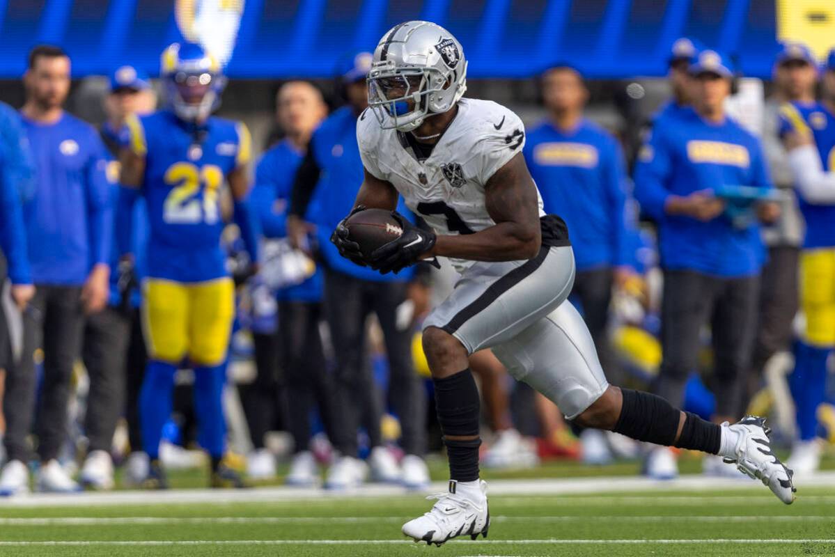 Raiders running back Zamir White (3) rushes with the football during the second half of an NFL ...