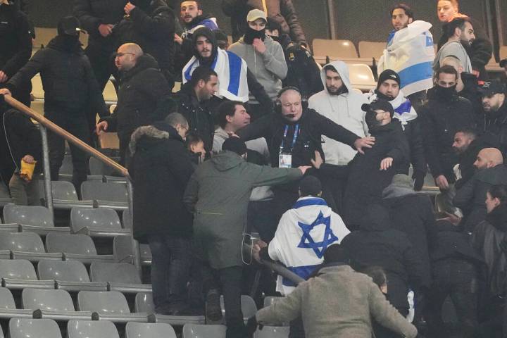 Fans argue on stands during the UEFA Nations League soccer match between France and Israel at t ...