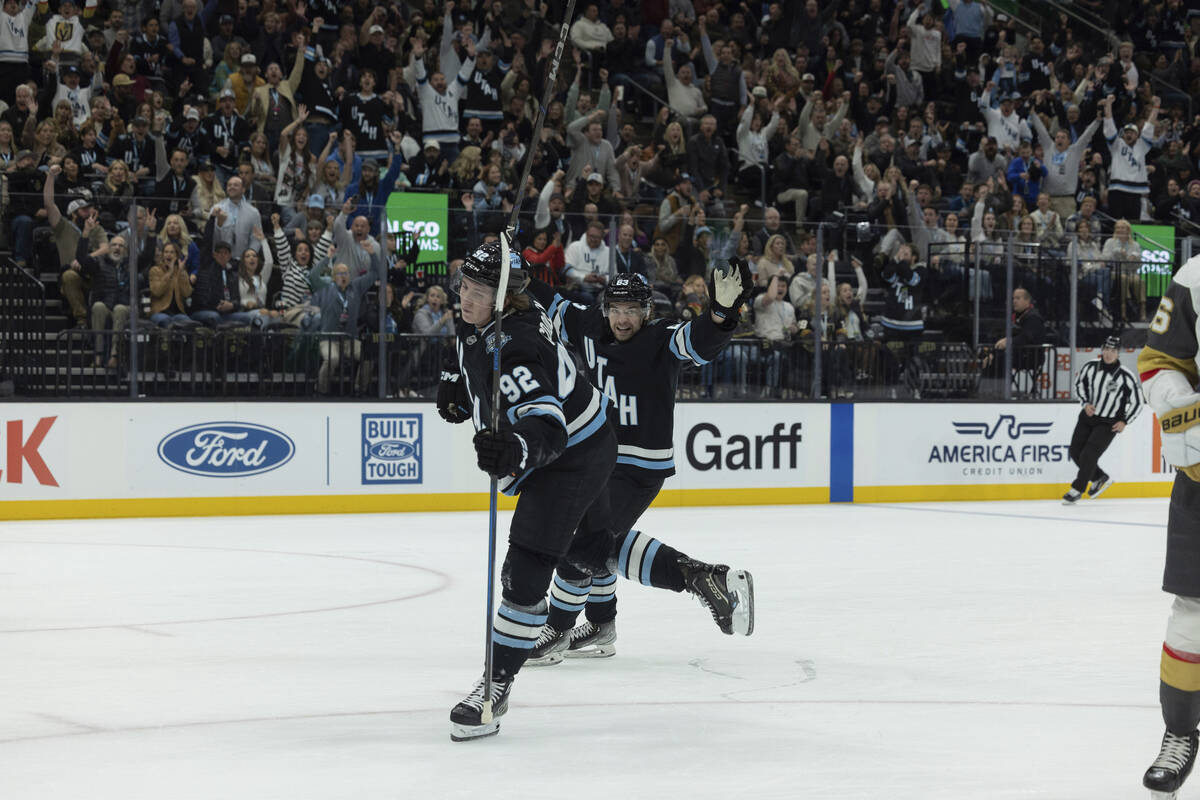 Utah Hockey Club left wing Matias Maccelli (63) celebrates center Logan Cooley's (92) goal agai ...