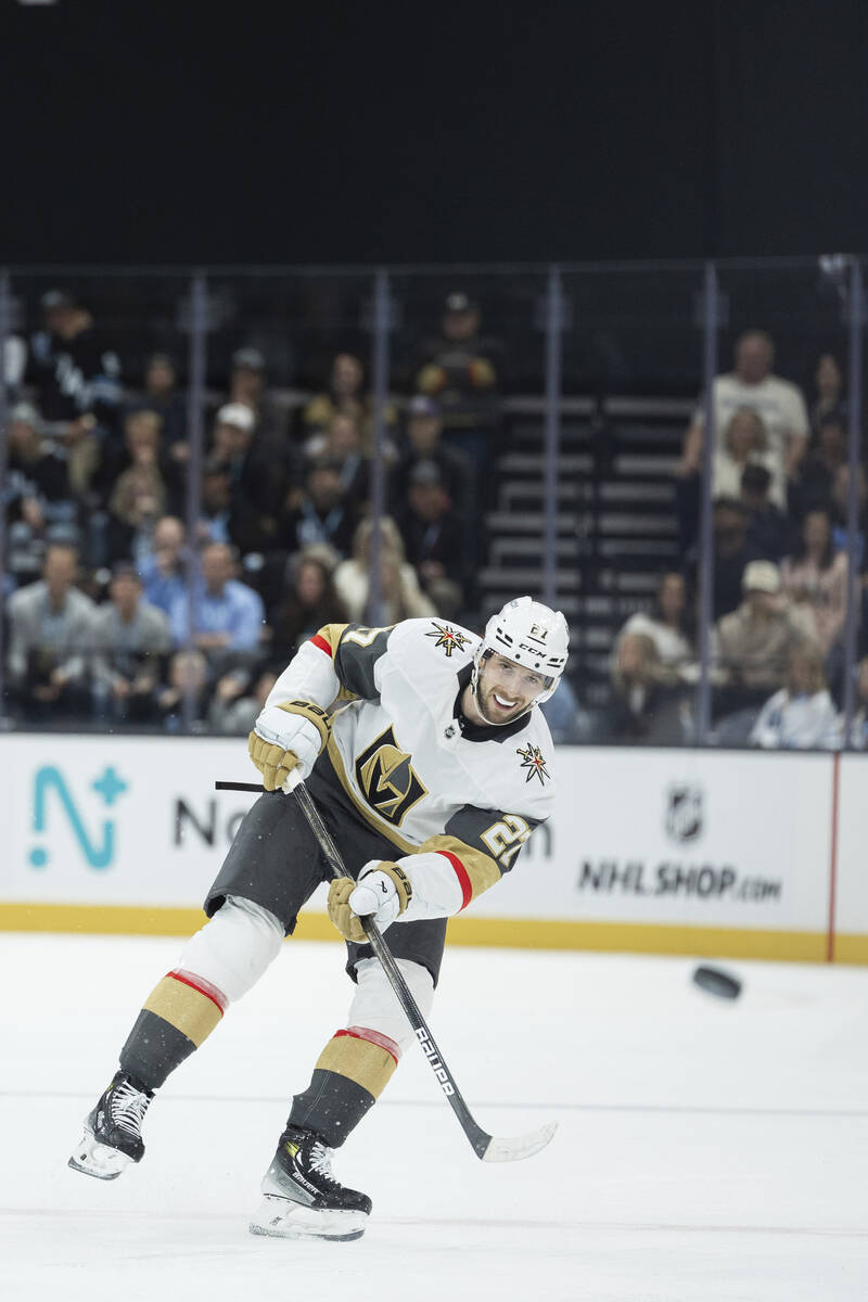 Vegas Golden Knights defenseman Shea Theodore (27) shoots against the Utah Hockey Club during t ...