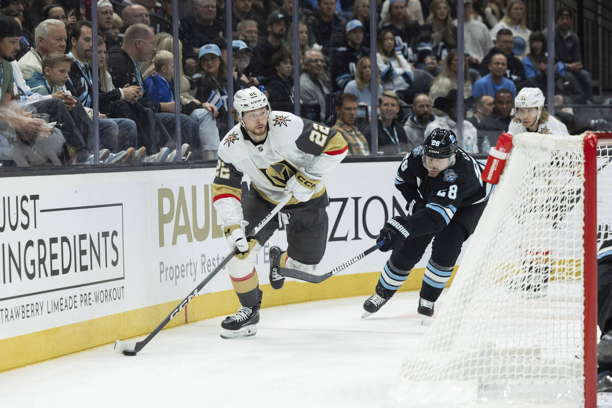 Vegas Golden Knights right wing Cole Schwindt (22) moves the puck against Utah Hockey Club defe ...