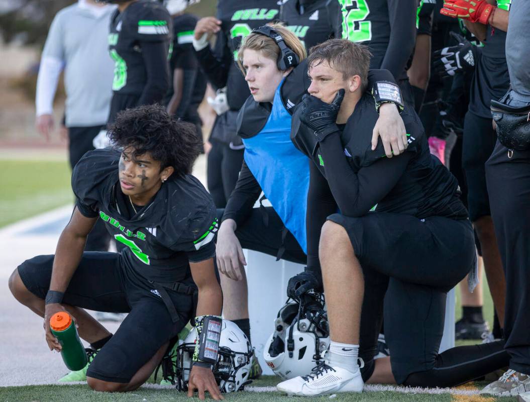 Members of SLAM Academy watch as Churchill County players prepare to attempt a two-point conver ...