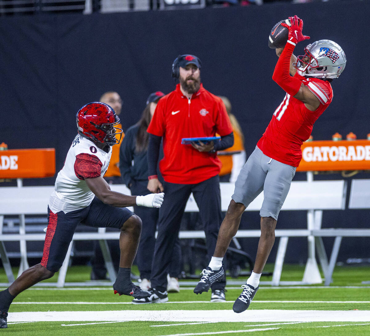 UNLV wide receiver Ricky White III (11) elevates for a long reception as San Diego State Aztecs ...