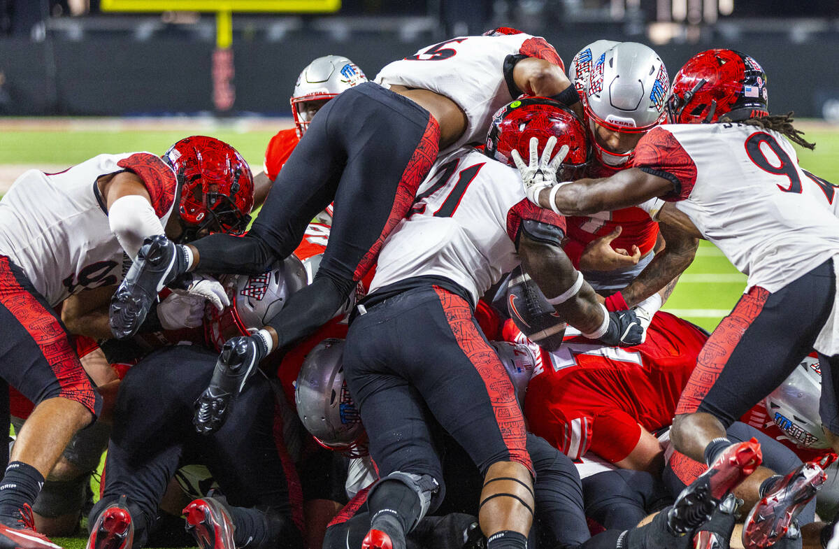 UNLV quarterback Cameron Friel (7) fumbles the ball while attempting to score near the end zone ...