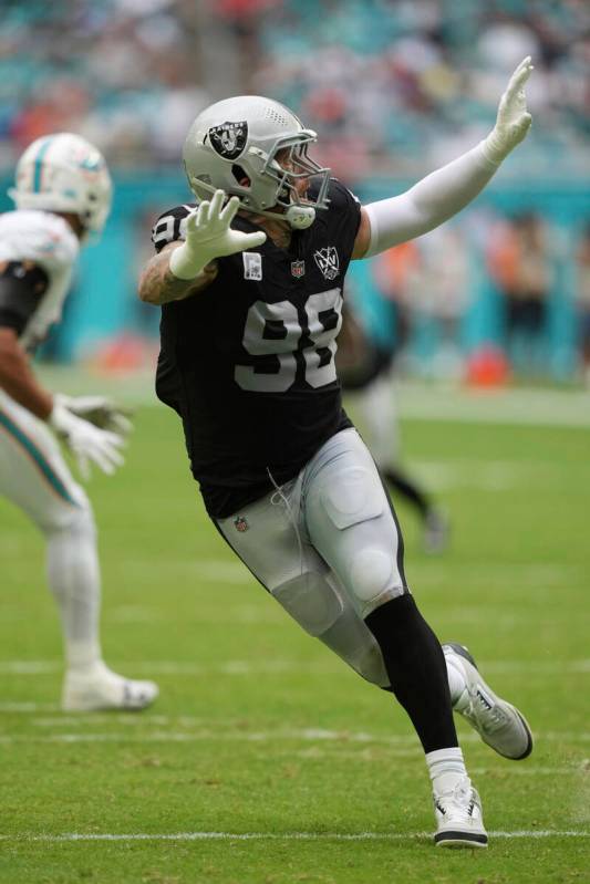 Las Vegas Raiders defensive end Maxx Crosby (98) runs a play during the second half of an NFL f ...