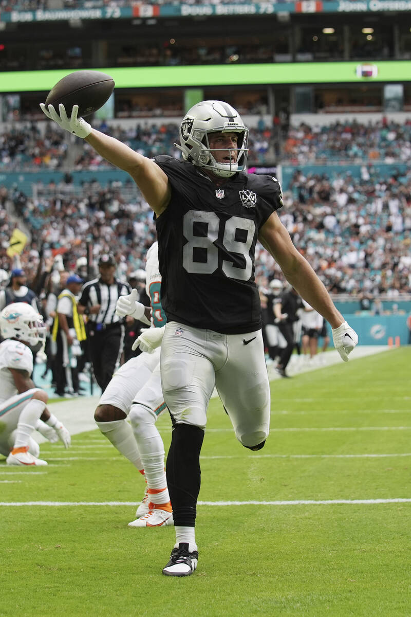 Las Vegas Raiders tight end Brock Bowers (89) scores a touchdown during the second half of an N ...