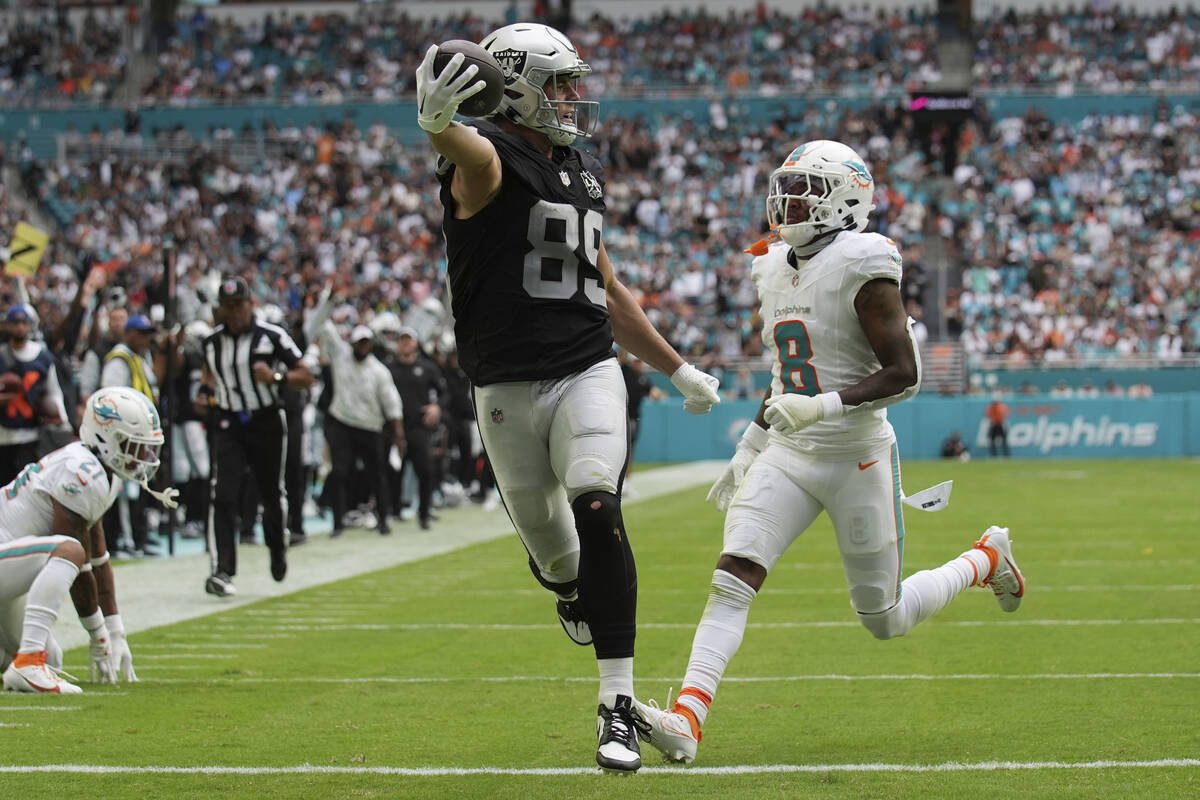 Las Vegas Raiders tight end Brock Bowers (89) scores a touchdown during the second half of an N ...