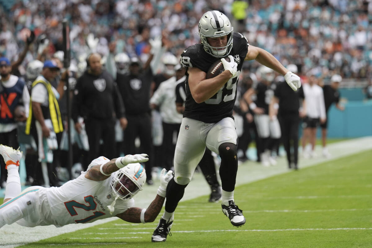 Las Vegas Raiders tight end Brock Bowers (89) runs for a touchdown during the second half of an ...