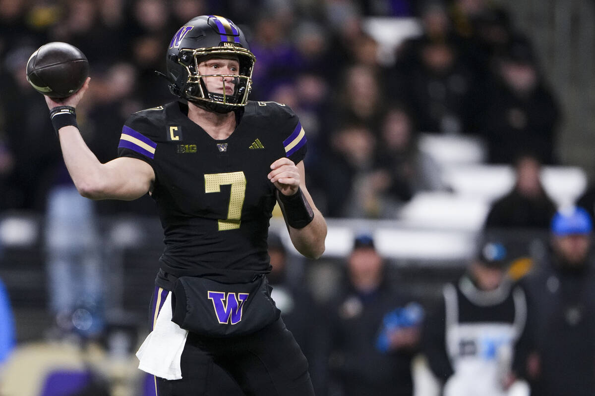 Washington quarterback Will Rogers throws against UCLA during the first half of an NCAA college ...