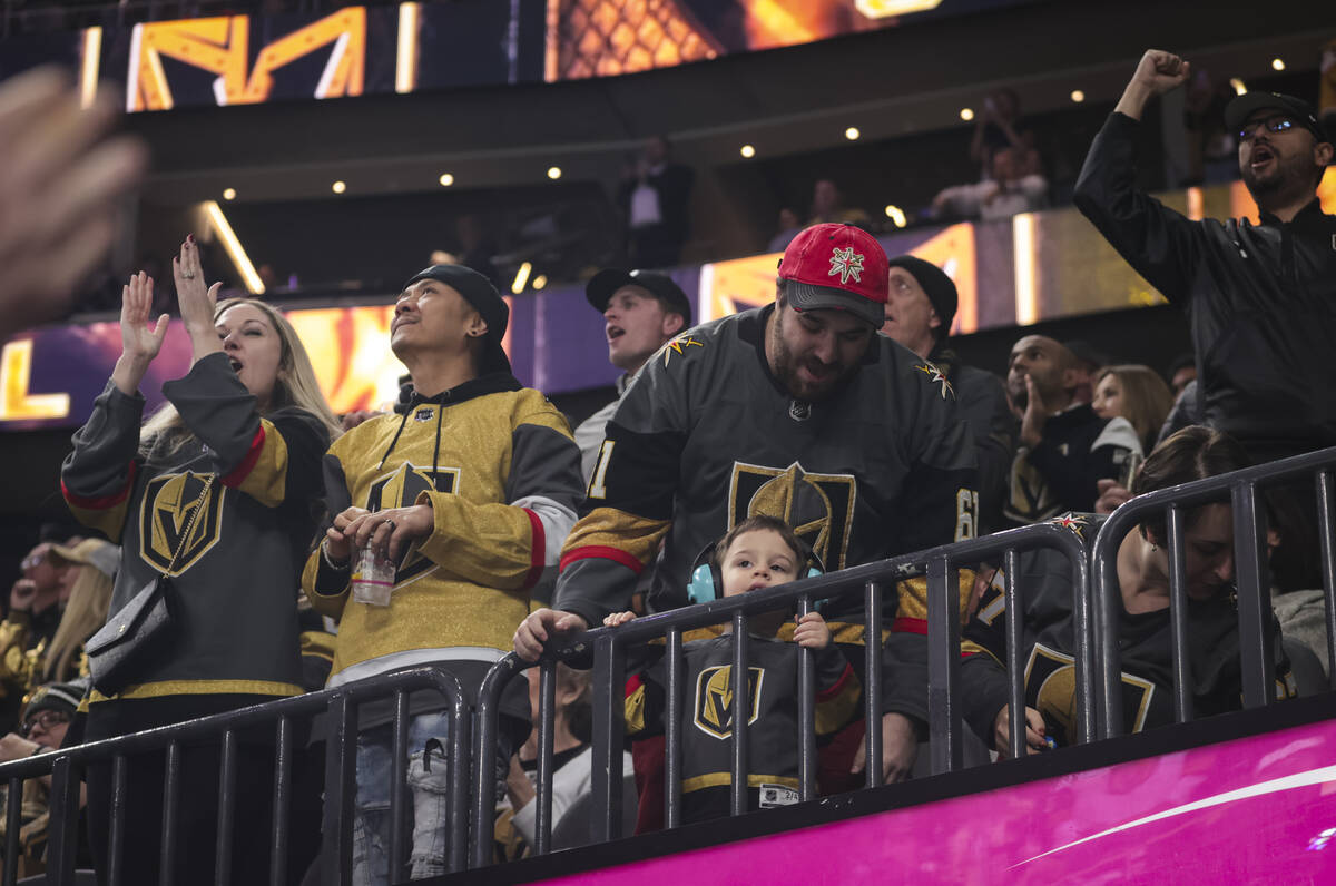 Golden Knights fans celebrate after a goal against the Washington Capitals during the first per ...