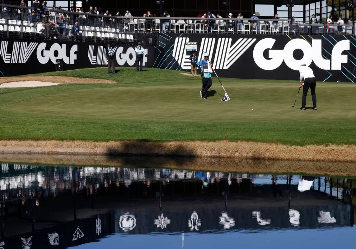 Sebastian Munoz of team Torque GC watches his putt on the 18th green during the second round of ...