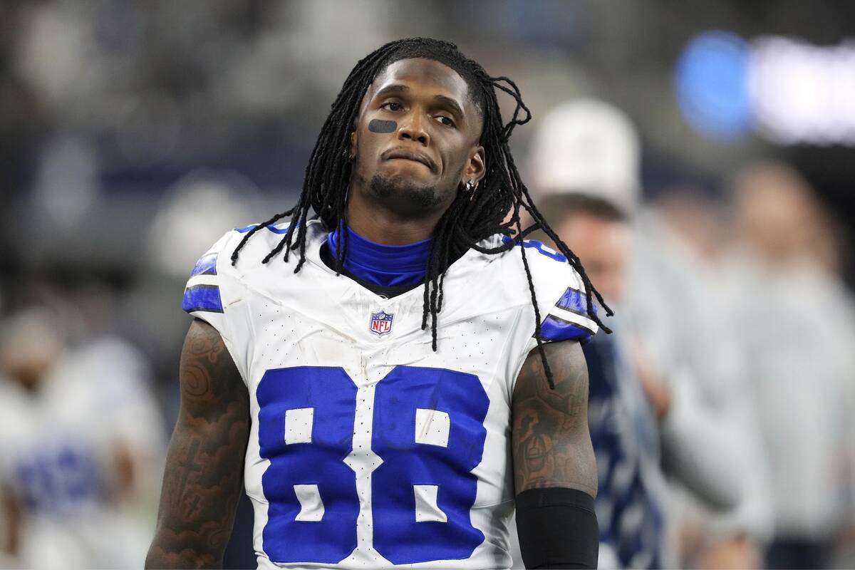 Dallas Cowboys wide receiver CeeDee Lamb walks on the sidelines during a football game against ...