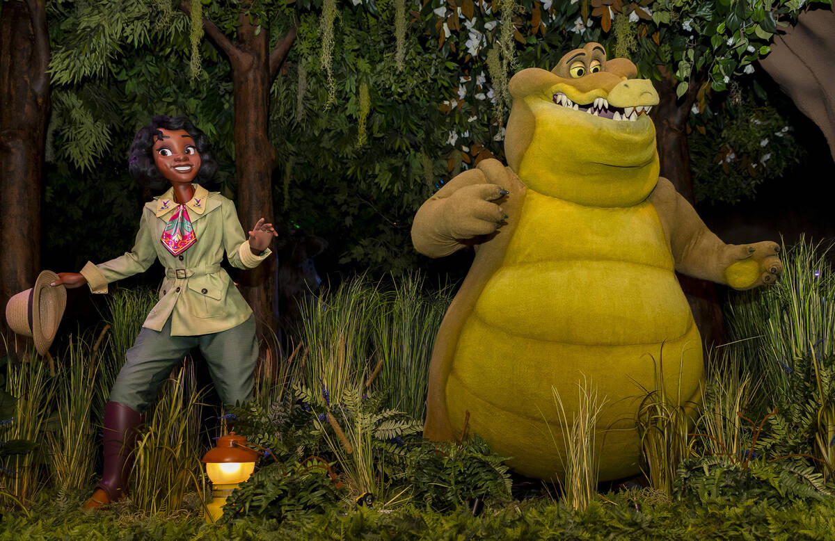 Princess Tiana and her alligator pal Louis in Tiana’s Bayou Adventure at Disneyland. (Ch ...