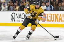 Golden Knights center Ivan Barbashev (49) controls the puck during the first period of the NHL ...