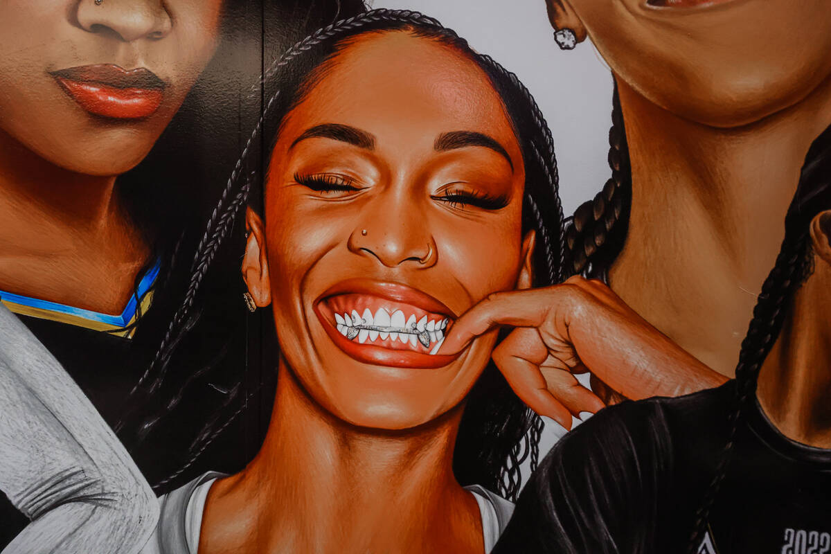 A mural of Las Vegas Aces center A’ja Wilson is seen at Playa Society’s booth during Comple ...