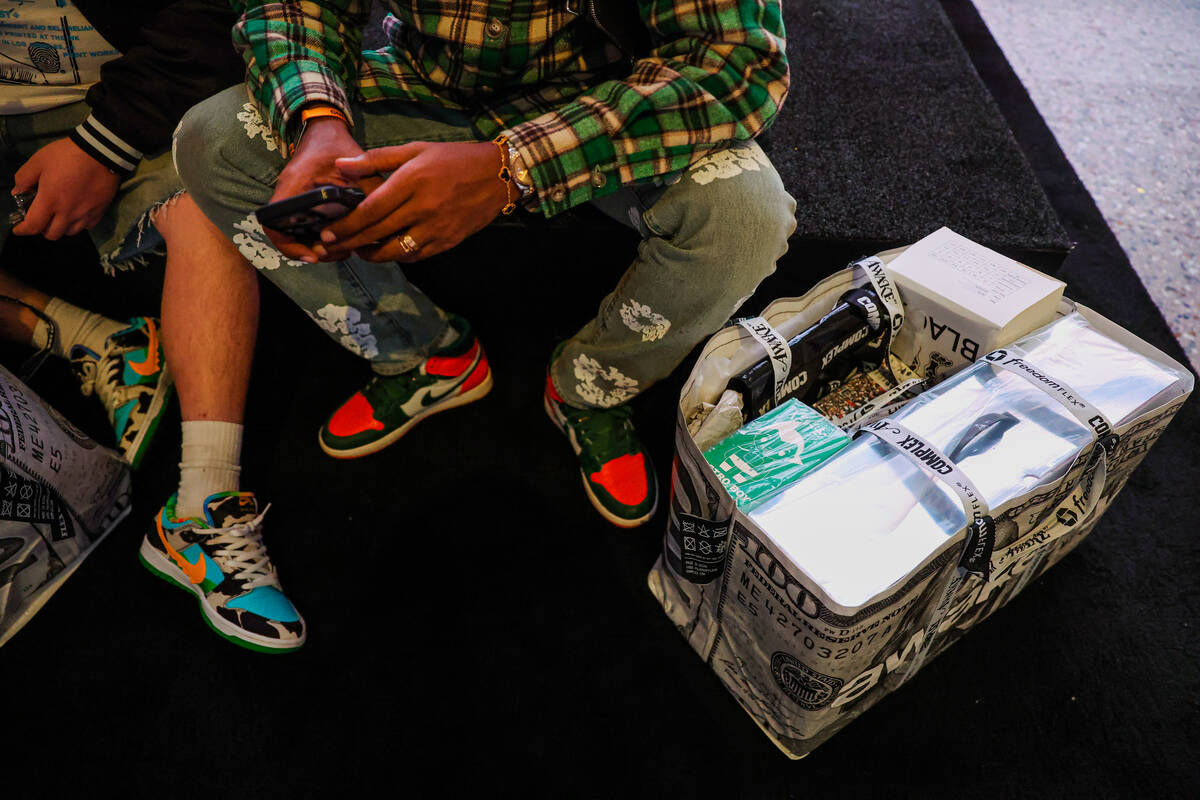 Collectibles and clothing are seen inside an attendee’s bag during ComplexCon at the Las Vega ...