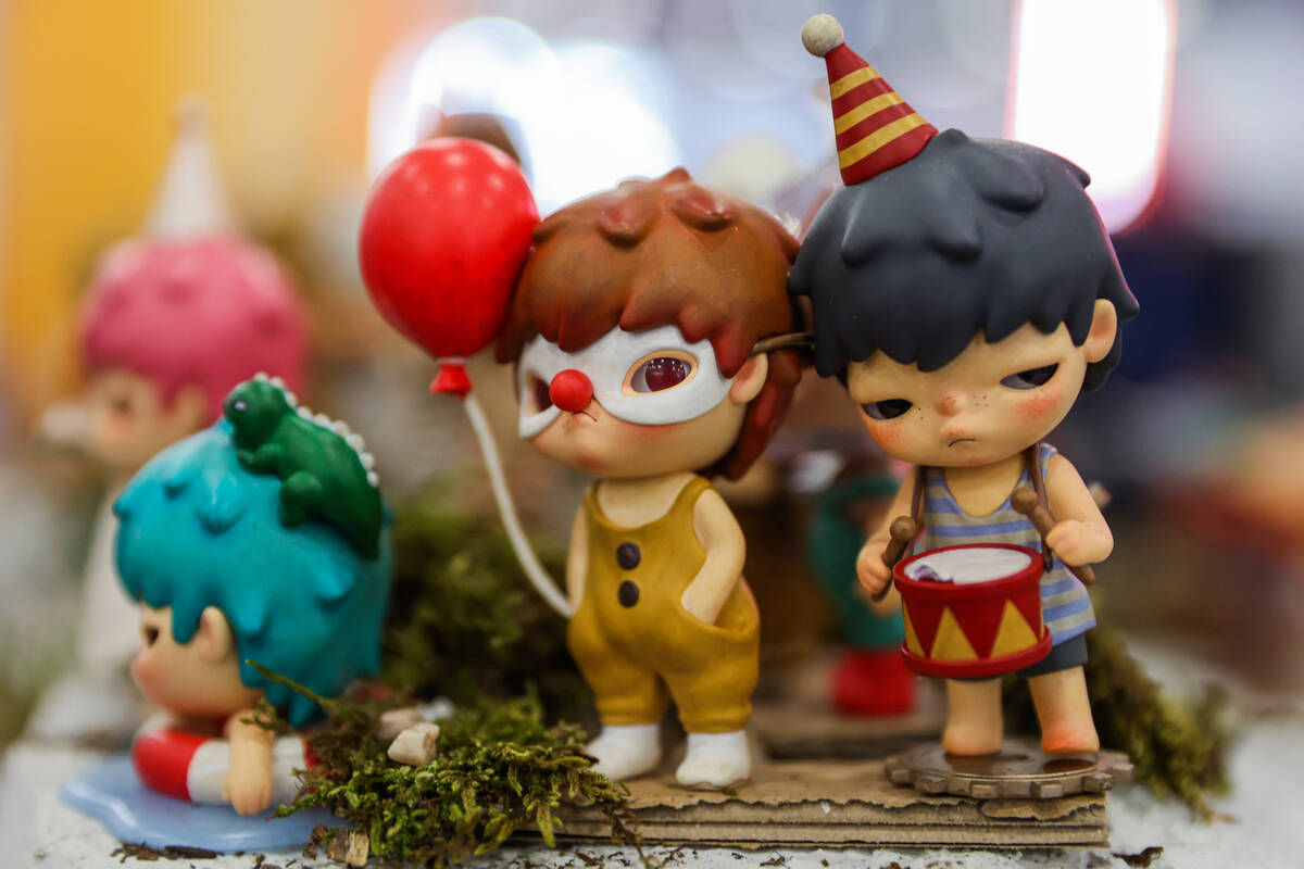 Blind box figurines of Hirono, a popular character by Beijing-based artist Lang, are seen on di ...