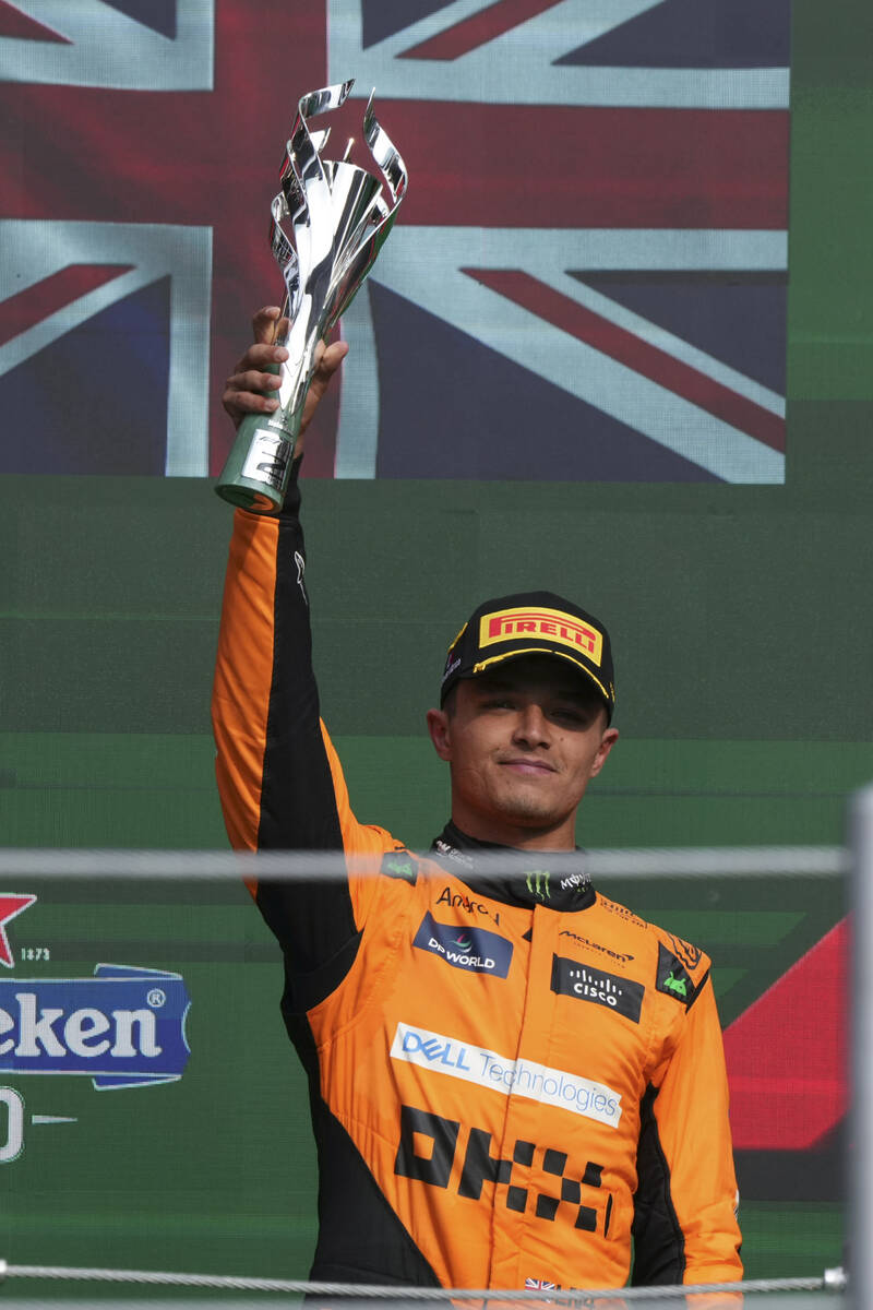 Second-placed finisher, McLaren driver Lando Norris of Britain, celebrates at the podium during ...