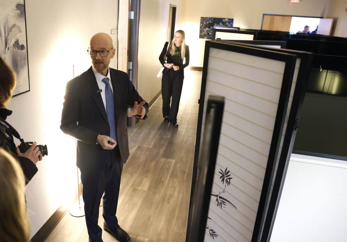 Dr. James Tenney, director of the Wellness Bureau, leads a tour of the newly opened facility on ...