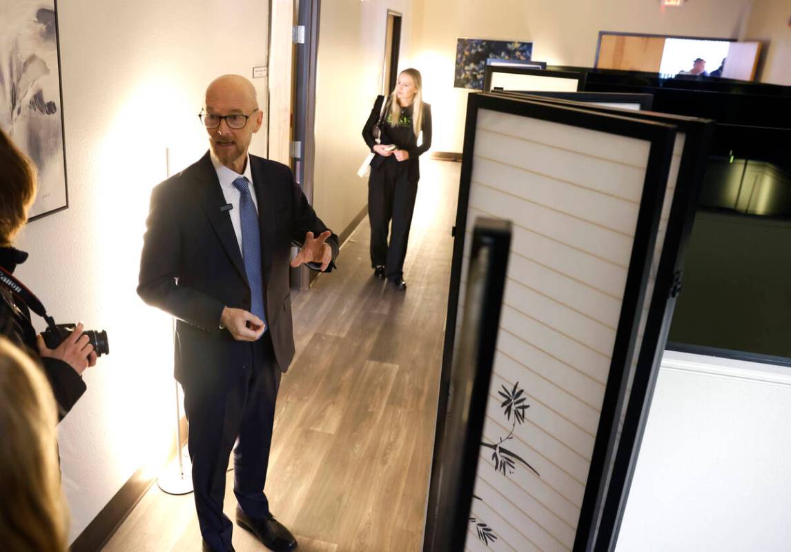 Dr. James Tenney, director of the Wellness Bureau, leads a tour of the newly opened facility on ...