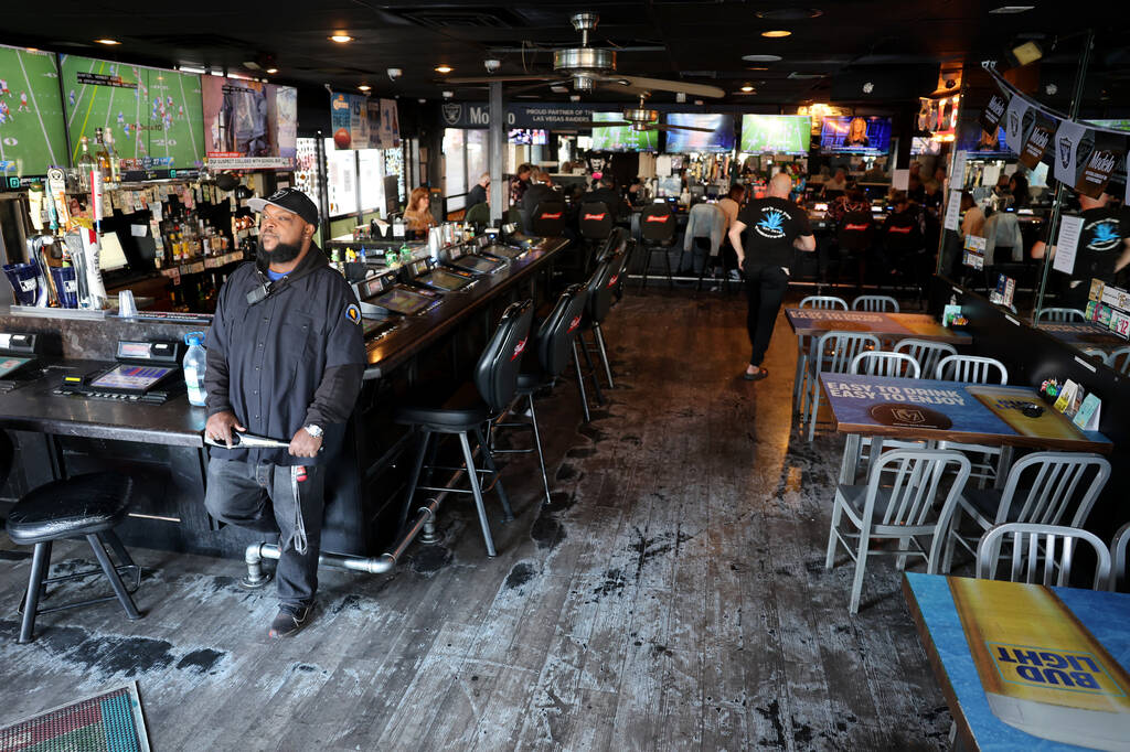 Bouncer Da’Ron Lamar Darden waits for customers at Stage Door Casino at the corner of Fl ...