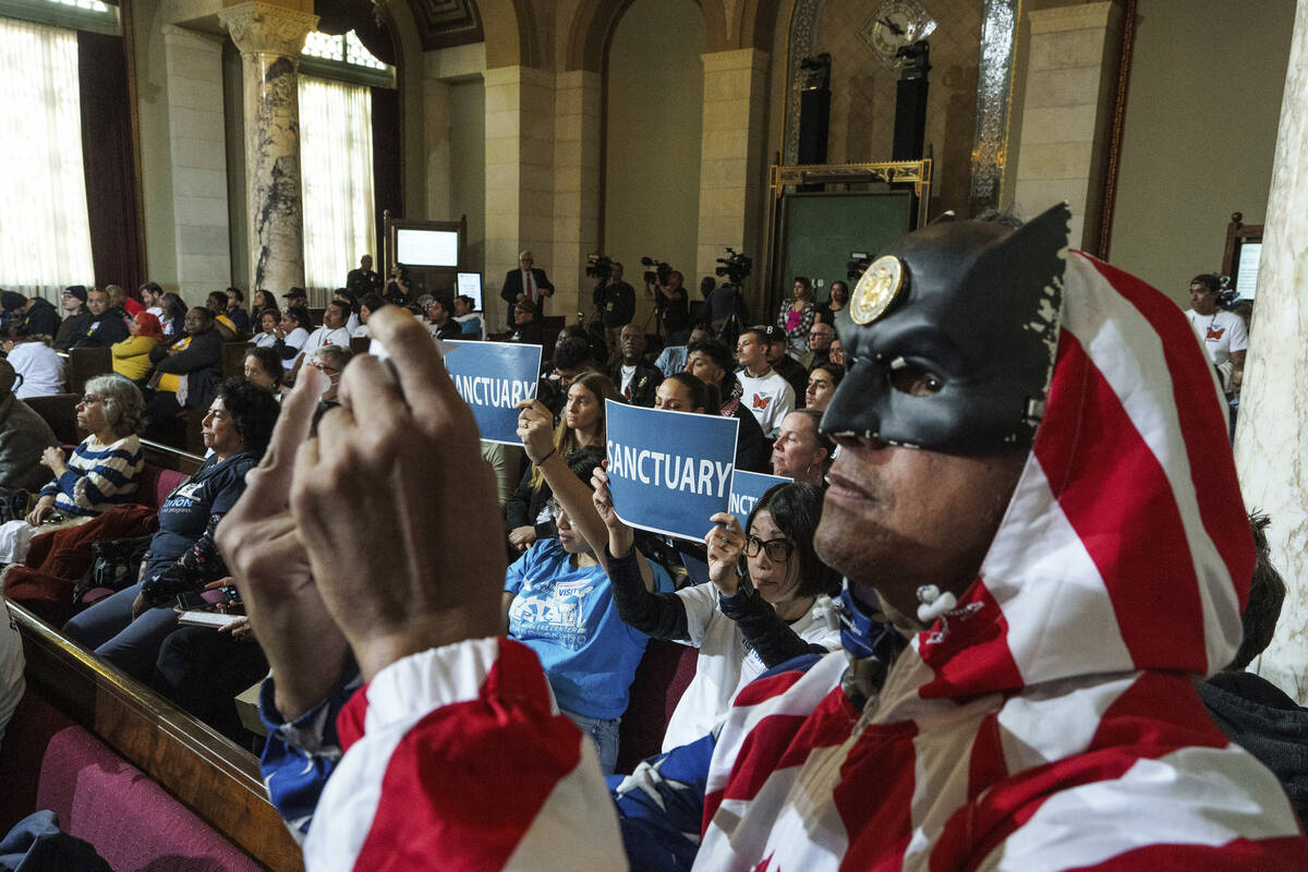 EDS NOTE: OBSCENITY - Protestor Herman Armando expresses his opposition during his public comme ...