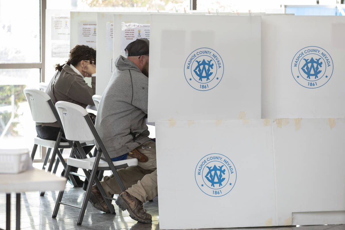 Washoe County early voting takes place at the Registrar of Voters Office in Reno, Nev., Tuesday ...