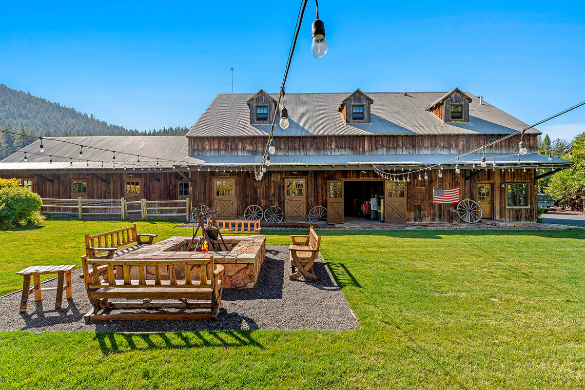 The 130-acre ranch has 17 residences and cabins on four lakefront properties. (Chase Internatio ...