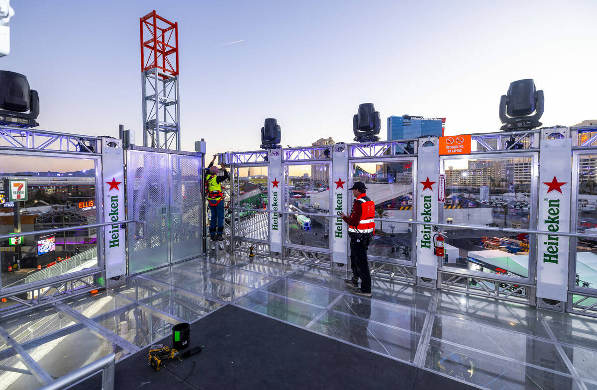 A crew continues to finish the tower near the Heineken Trophy Club beside Koval Lane and the F ...